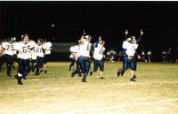 Pirates celebrating after a touchdown